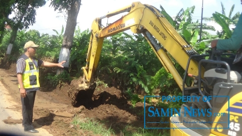 Air Alur Kali Simo Masih Terus Limpas ke Jalan Raya