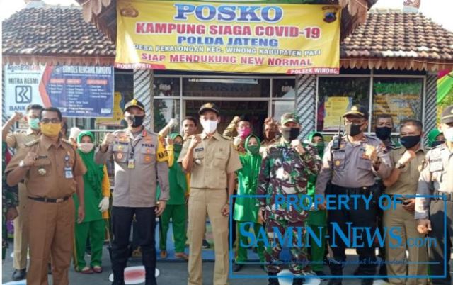 Dalam Mencanangkan Kampung Siaga Covid-19, Polres Pati Juga Bagikan Bantuan