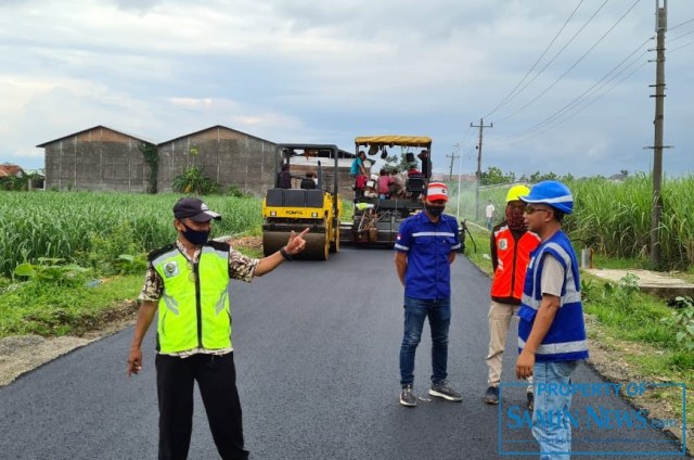 Progres Pekerjaan Peningkatan Ruas Jalan ke Objek Wisata Goa Pancur 100 Persen