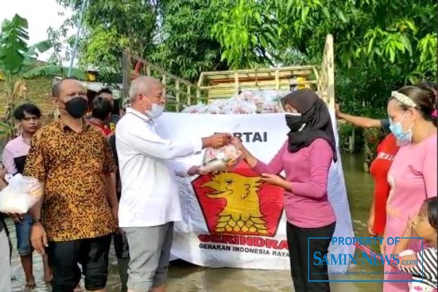 DPC Partai Gerindra Salurkan Paket Bantuan di Desa Gadudero