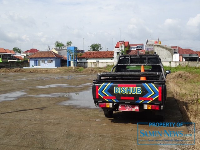 Area pangkalan truk di Desa Muktiharjo, Kecamatan Margorejo yang berlokasi di depan Stadion Joyokusumo Pati.(Foto:SN/aed)