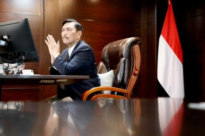 Menko Marves, Luhut Binsar Pandjaitan mengatakan pemerintah batal menerapkan PPKM level 3 di semua daerah saat libur Nataru. Foto: Kemenko Marves
