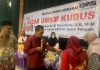 Rini Setiawati perwakilan dari Bank Indonesia bersama dengan Musthofa selaku Anggota Komisi XI DPR RI