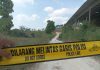 Aparat memasang garis polisi menuju lokasi tambang di Desa Wegil Kecamatan Sukolilo Kabupaten Pati